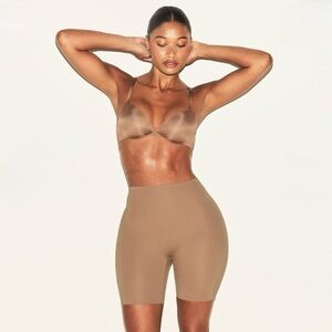 SKIMS Hip Shaping Mid Thigh Short in Color Sienna - Retail Price $180